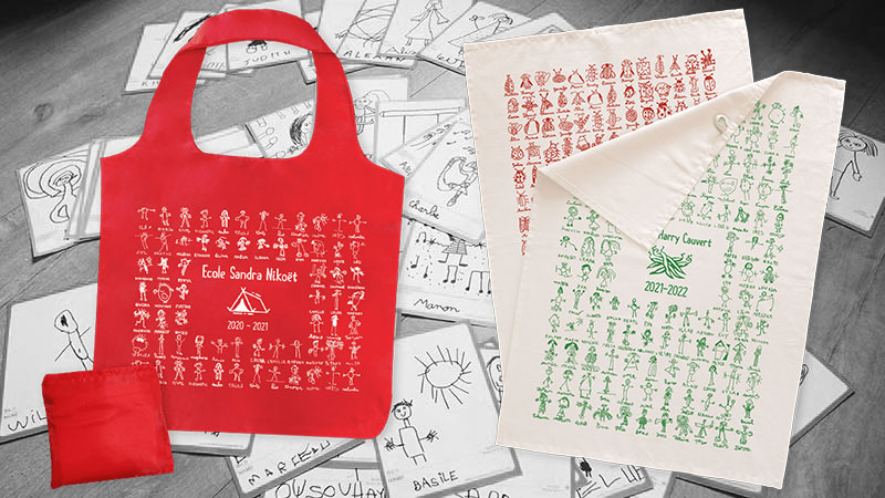 Lire la suite à propos de l’article Dessins d’enfants sur sacs et torchons, et gilets de sécurité au logo de l’école&nbsp;!